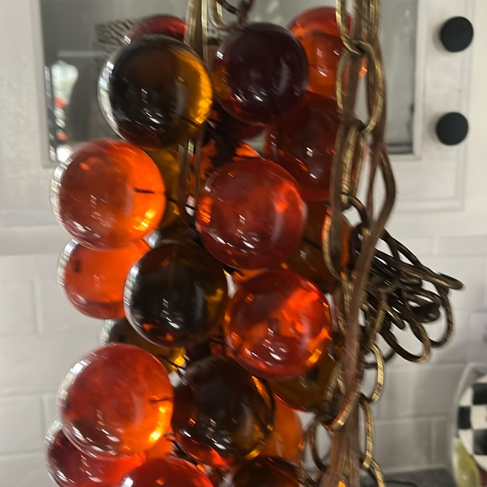 Orange Lucite grape light hanging